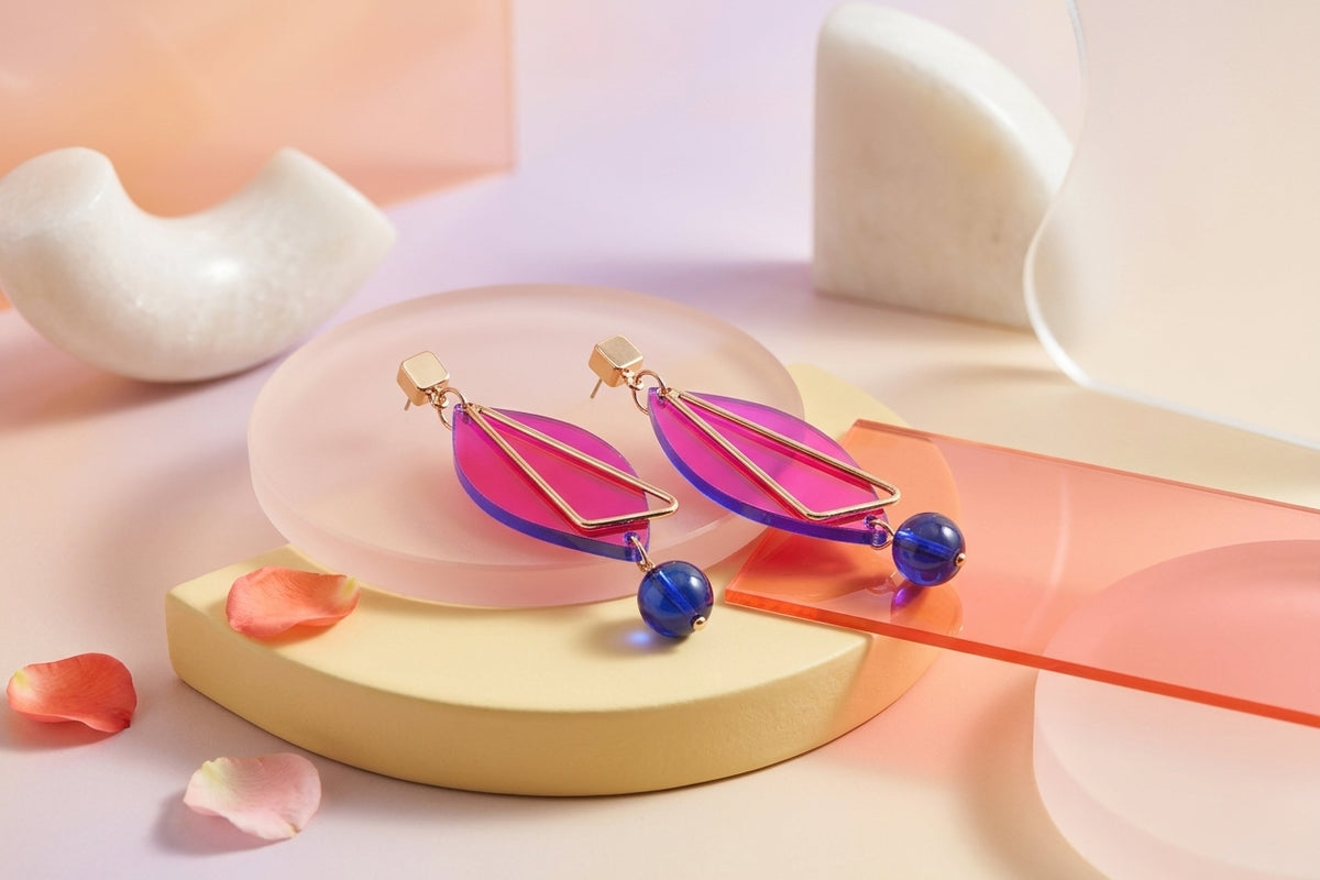 HB Ada geometric acrylic statement earrings in a styled product setting