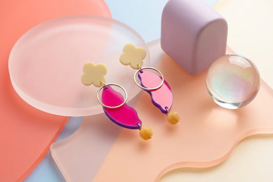 HB Ayla modern acrylic statement earrings in a styled product setting
