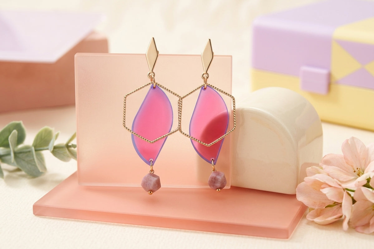 HB Elise long heart dangle earrings in a styled product setting