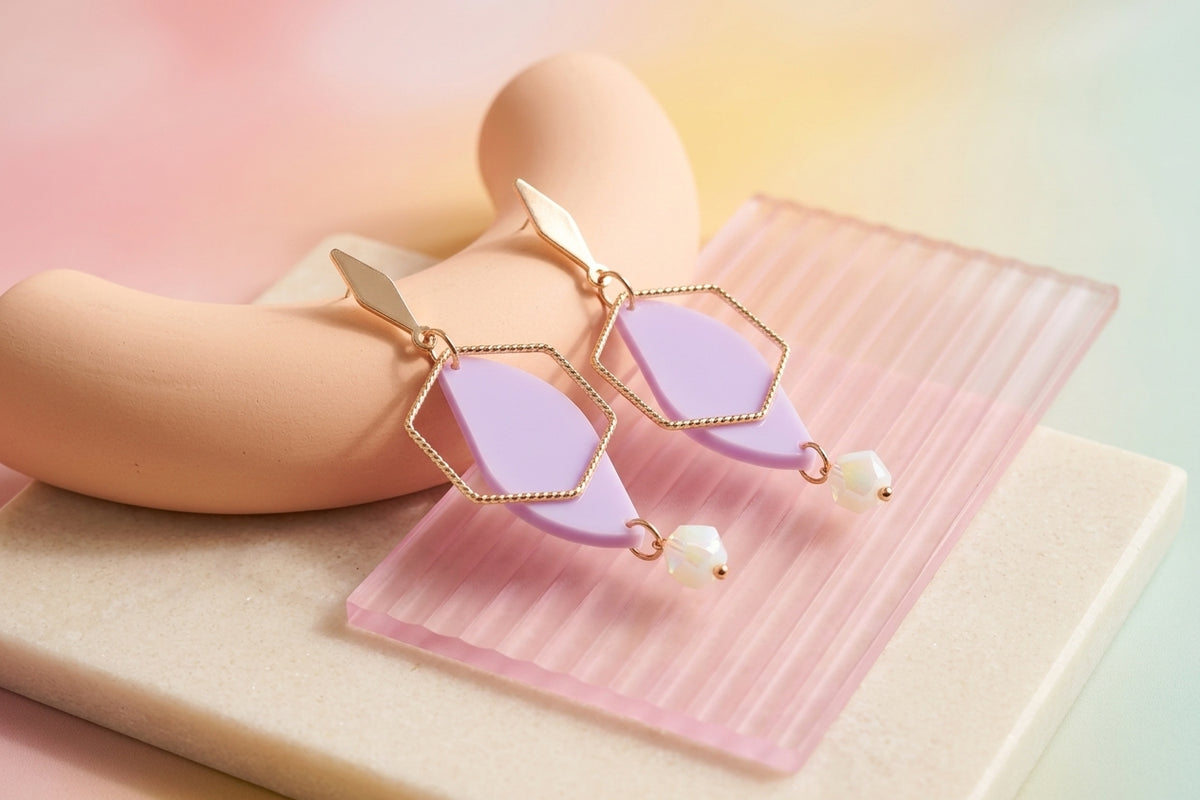 Purple Elise long heart dangle earrings in a styled product setting