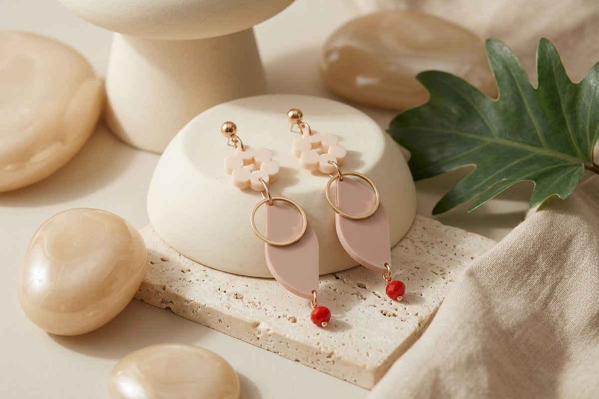 Beige Elsa floral long dangle earrings in a styled product setting