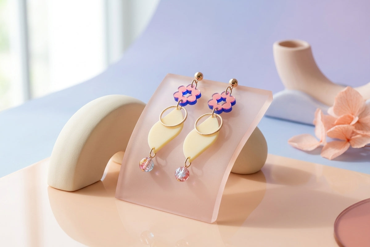HB Elsa floral long dangle earrings in a styled product setting