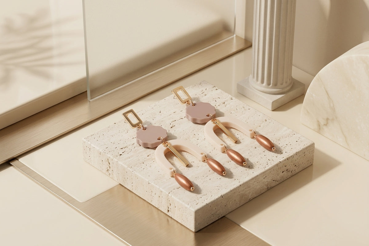 Beige Eva geometric beaded drop earrings in a styled product setting