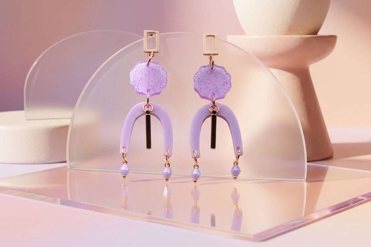 Purple Eva geometric beaded drop earrings in a styled product setting