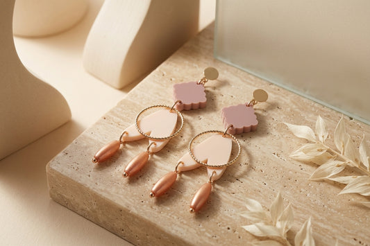 Beige Fleur geometric acrylic statement earrings in a styled product setting