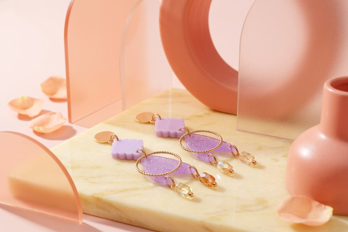 Purple Fleur geometric acrylic statement earrings in a styled product setting