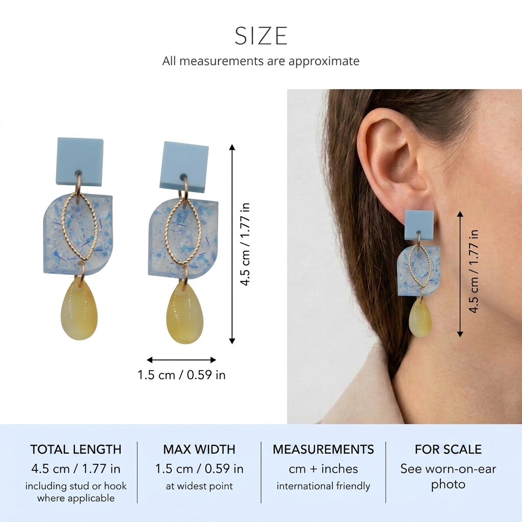 Freya small geometric dangle earrings size guide showing 4.5 × 1.5 cm