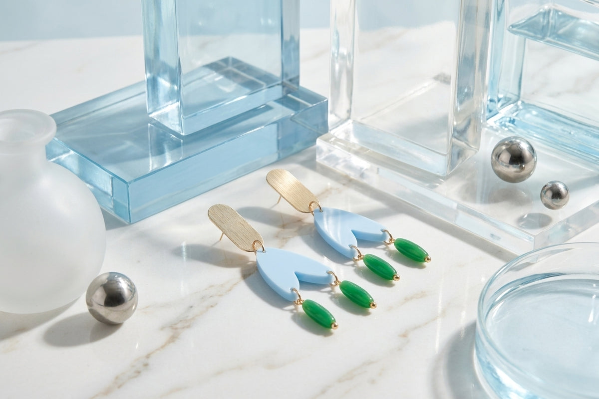 Blue Iris geometric long drop earrings in a styled product setting