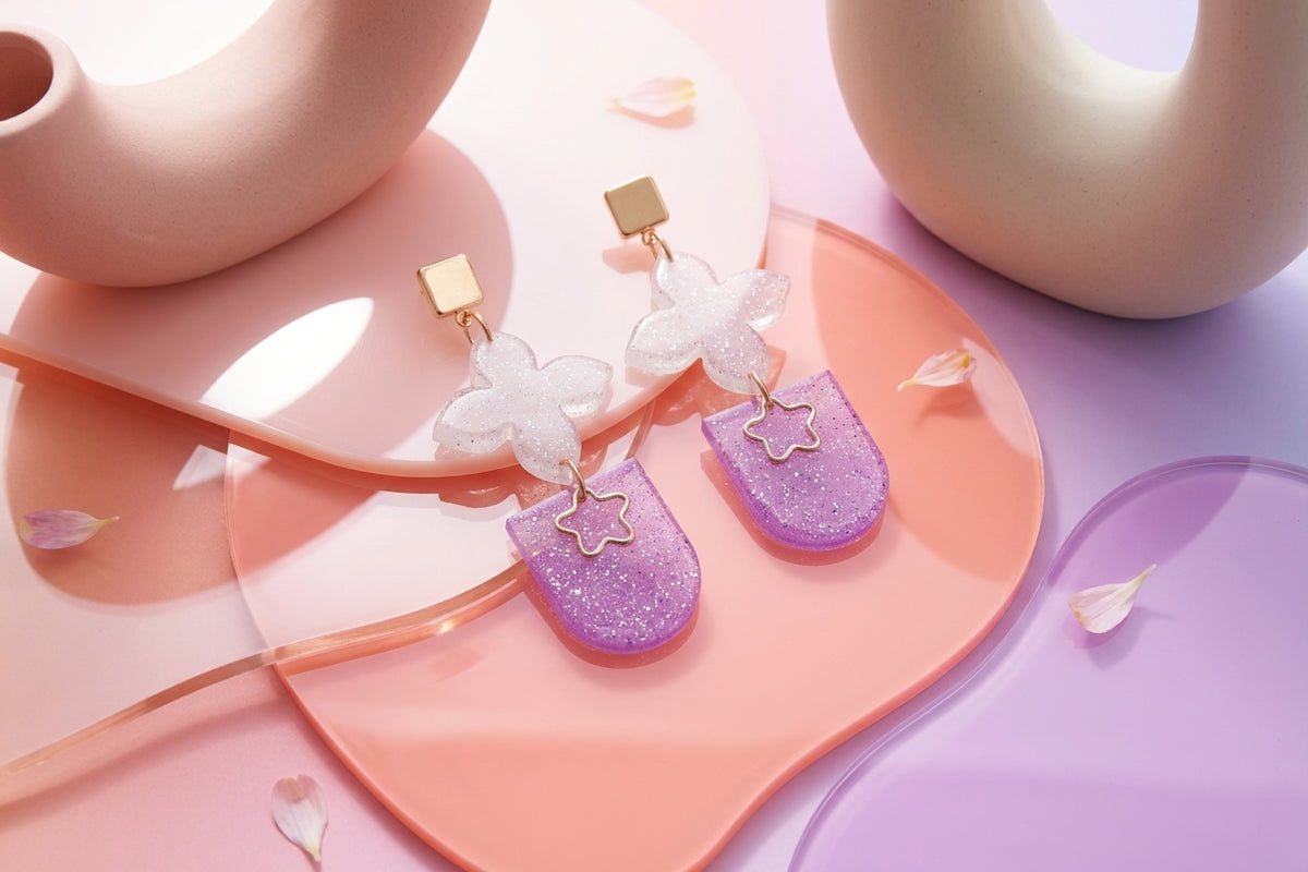 Purple Lia floral heart drop earrings in a styled product setting