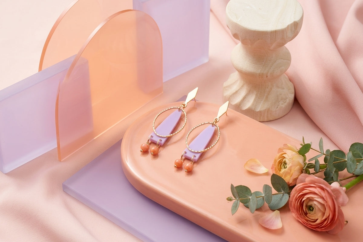 Purple Lina long geometric acrylic earrings in a styled product setting