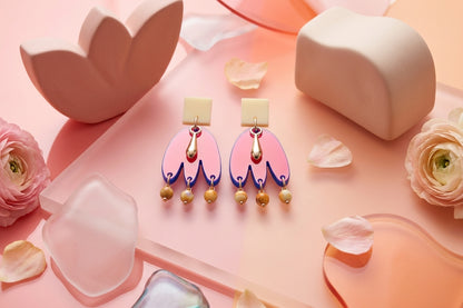 HB Liv acrylic beaded statement earrings in a styled product setting