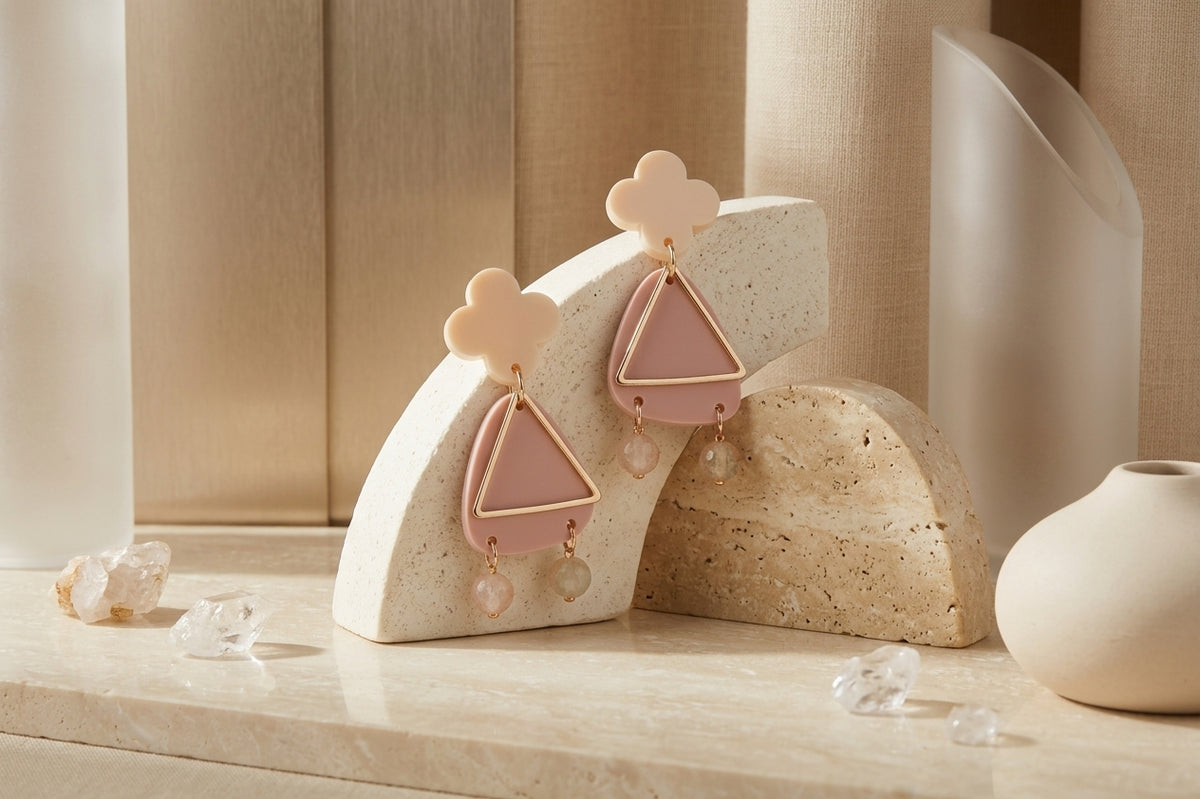 Beige Maud flower statement earrings in a styled product setting