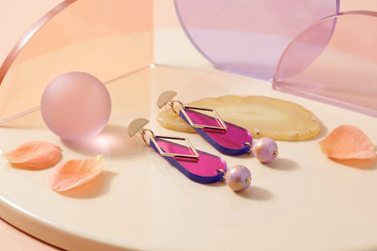 HB Mila teardrop statement earrings in a styled product setting