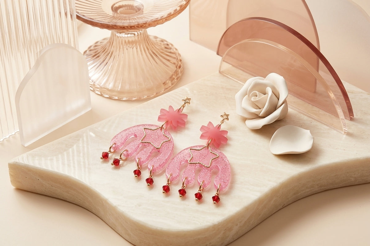Pink Saar large flower statement earrings in a styled product setting