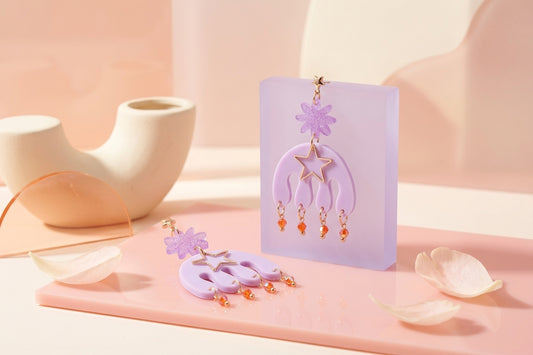 Purple Saar large flower statement earrings in a styled product setting