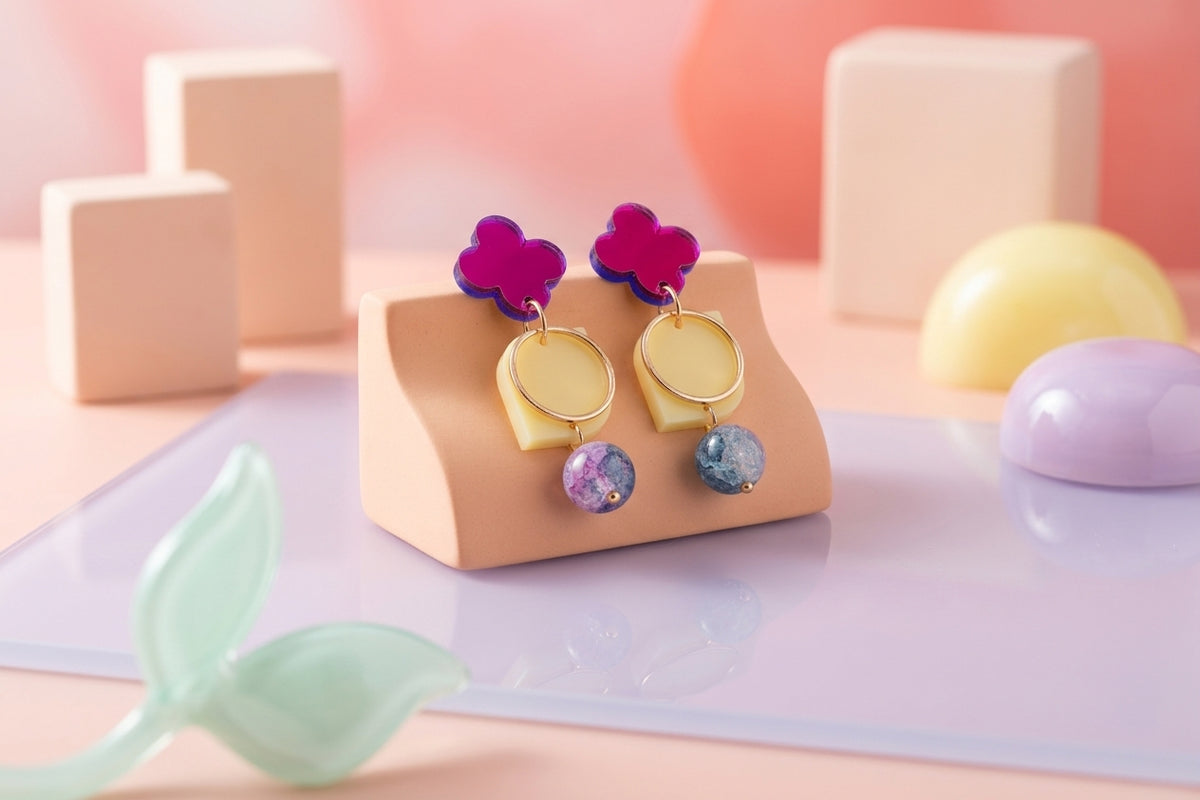HB Zoe floral geometric drop earrings in a styled product setting
